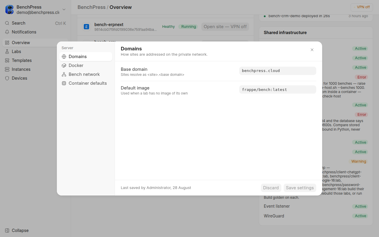 The BenchPress settings dialog on the Domains panel, with a four-item sidebar reading Domains, Docker, Bench network and Container defaults.
